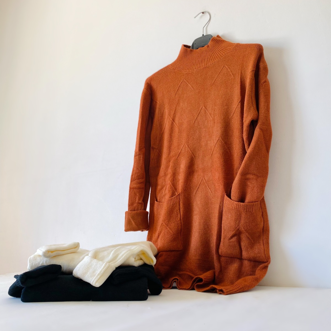 POLERA LARGA CON BOLSILLOS