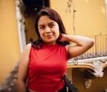 Charming portrait of a woman in a red top in Puebla, Mexico